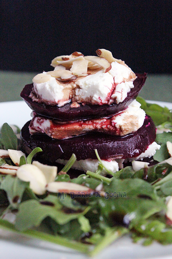 Beets with goat cheese, arugula and almonds