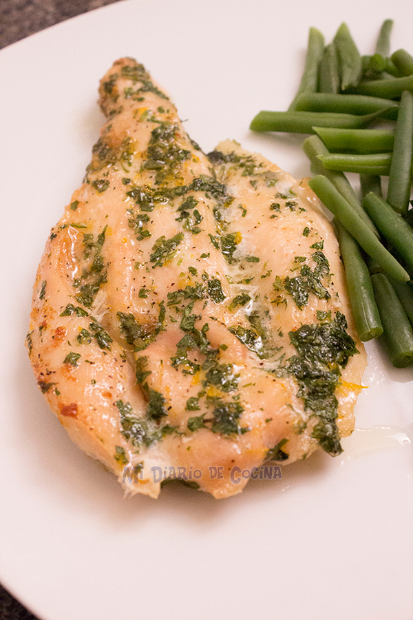 Oven baked chicken fillet with parsley and lemon