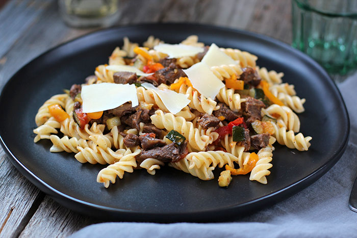 Pasta with beef and vegetables sauté