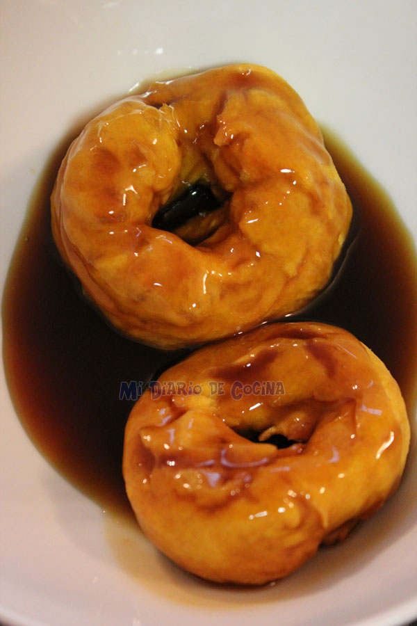 Picarones (pumpkin donuts) with panela sauce