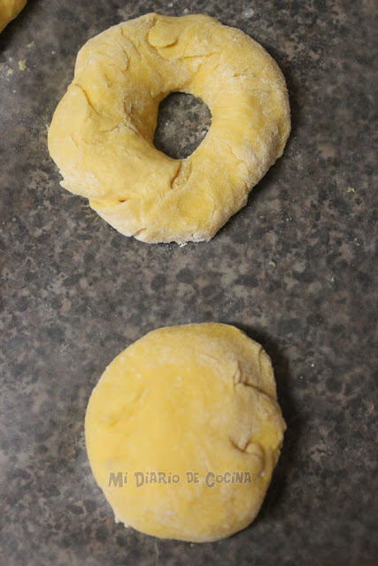 Picarones (pumpkin donuts) with panela sauce