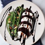 Beets with goat cheese, arugula and almonds