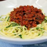 Zucchini pasta with tomatoes and meat sauce