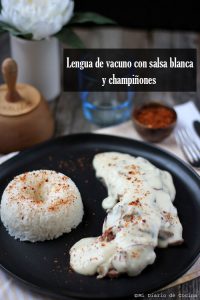 Lengua de vacuno con salsa blanca con champiñones